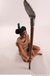 ANISE SITTING POSE WITH SPEAR